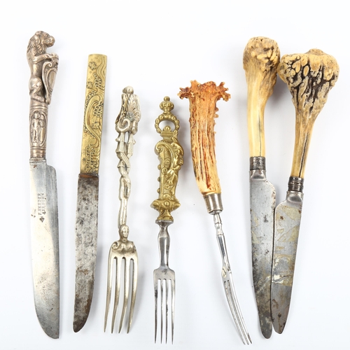 1037 - A group of 19th century armorial-handled knives and forks and 3 staghorn-handled knives and forks (7... 