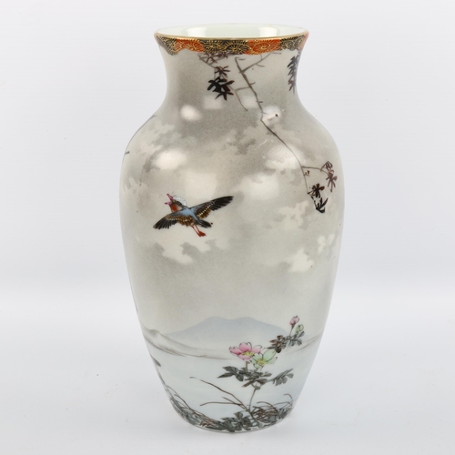 1049 - A Japanese porcelain vase with hand painted decoration, signed under base, height 25cm