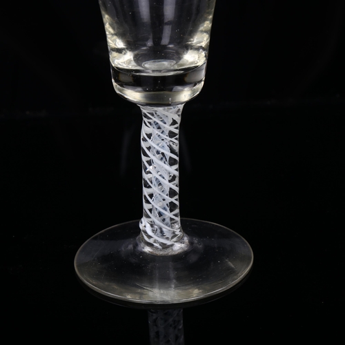 1055 - Antique cordial glass with milk twist stem, height 11.5cm, bowl diameter 42mm