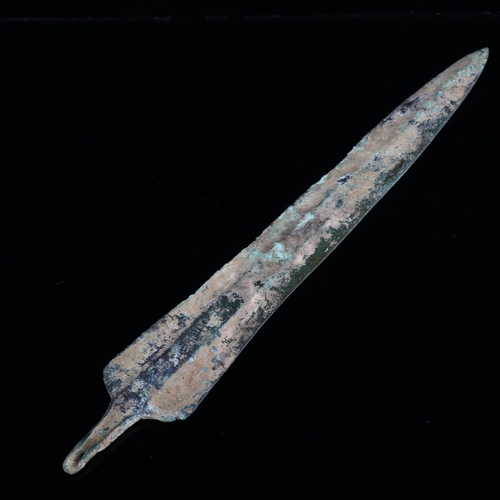 1057 - A small bronze, Near Eastern, Luristan culture sword, probably circa 1,000 BC, length 34cm