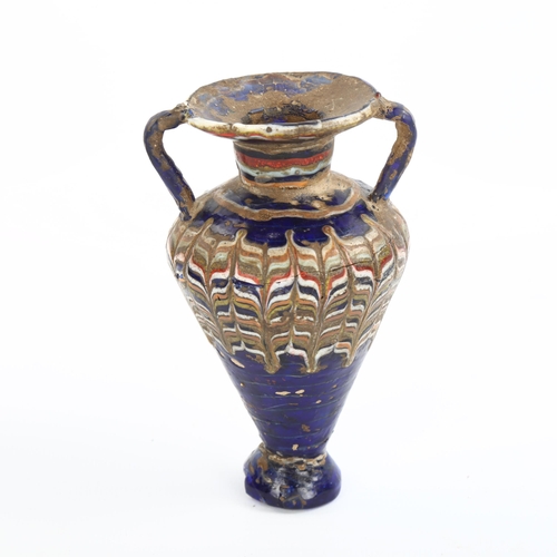 1060 - An ancient Greek Glass Amphoriskos, perfume bottle, probably 2nd-3rd century BC, height 11cm