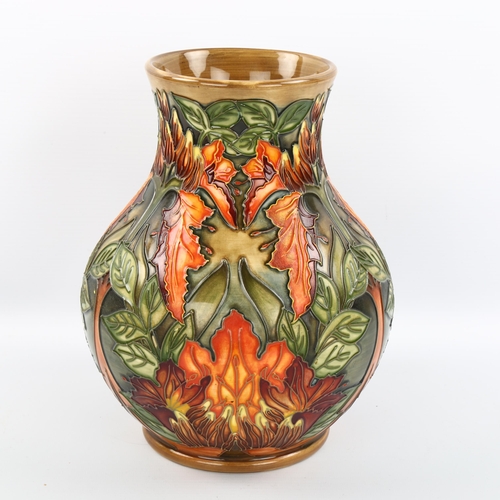 1068 - MOORCROFT - a Flames of the Forest pattern vase, designed by Philip Gibson 1997, height 24cm