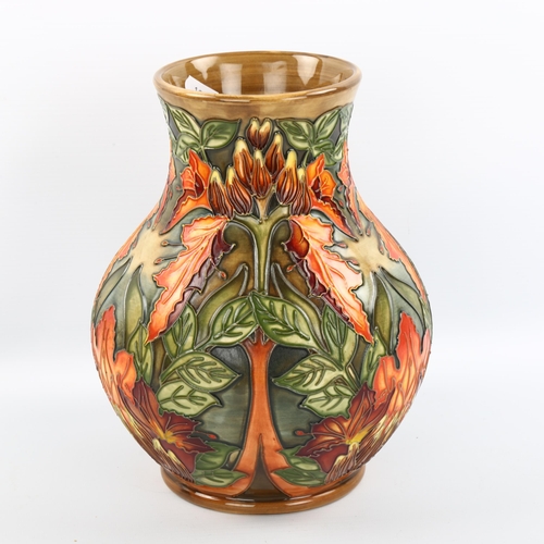 1068 - MOORCROFT - a Flames of the Forest pattern vase, designed by Philip Gibson 1997, height 24cm