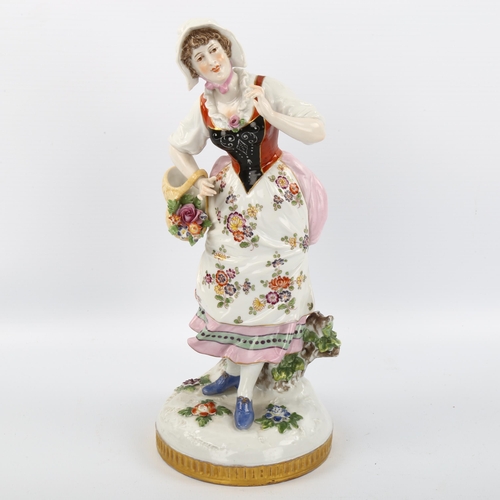 1073 - Dresden porcelain figure of a woman with flower basket, height 25cm