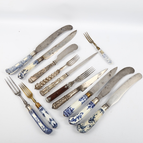 1104 - A group of 18th century Meissen blue and white porcelain-handled knives and forks, a silver-handled ... 