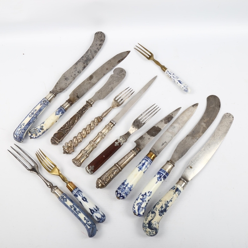 1104 - A group of 18th century Meissen blue and white porcelain-handled knives and forks, a silver-handled ... 