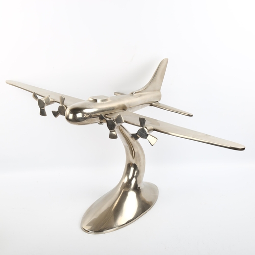 1110 - A cast-aluminium desk ornament of a 4-propeller aircraft, wingspan 81cm, length 48cm