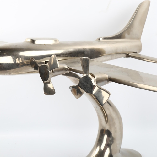 1110 - A cast-aluminium desk ornament of a 4-propeller aircraft, wingspan 81cm, length 48cm