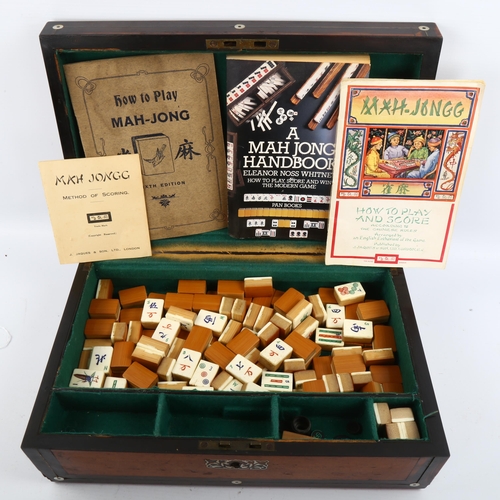 1115 - A Chinese bone and bamboo Mahjong set, with racks and instructions in Victorian inlaid box