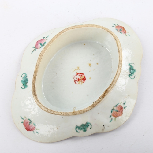 1116 - A Chinese oval porcelain dish on foot, with painted enamel decoration and text, length 23cm