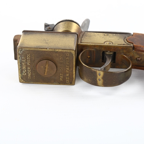 1119 - A Dunhill tinder pistol lighter, patent no. 592139, length 14cm