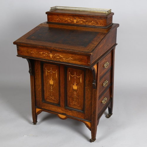 1131 - A Victorian rosewood and marquetry inlaid Davenport, width 60cm