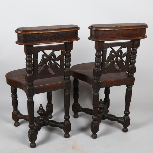 1132 - A pair of 19th century oak prayer chairs, with lidded upper compartments to the backs, carved and pi... 