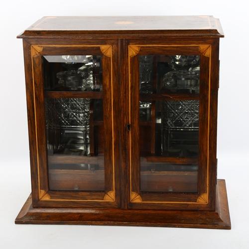 1144 - An Edwardian inlaid oak smoker's cabinet, with bevelled glass panelled doors, width 36cm, height 36c... 