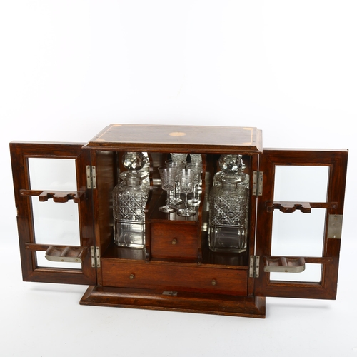 1144 - An Edwardian inlaid oak smoker's cabinet, with bevelled glass panelled doors, width 36cm, height 36c... 