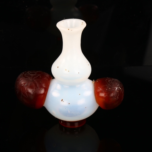 1146 - A Chinese two-colour Peking glass vase with fruit design handles, height 9.5cm