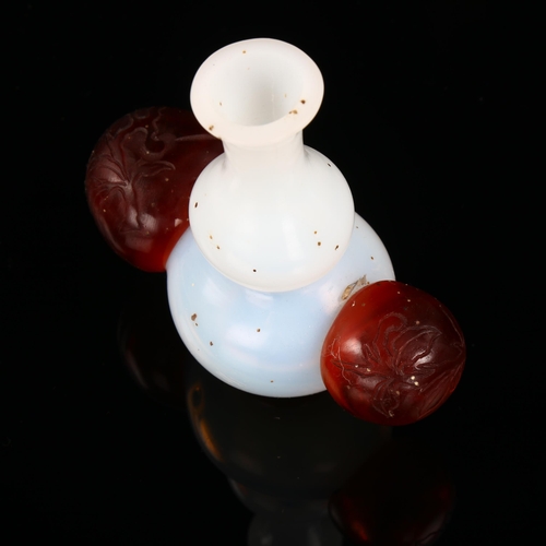 1146 - A Chinese two-colour Peking glass vase with fruit design handles, height 9.5cm