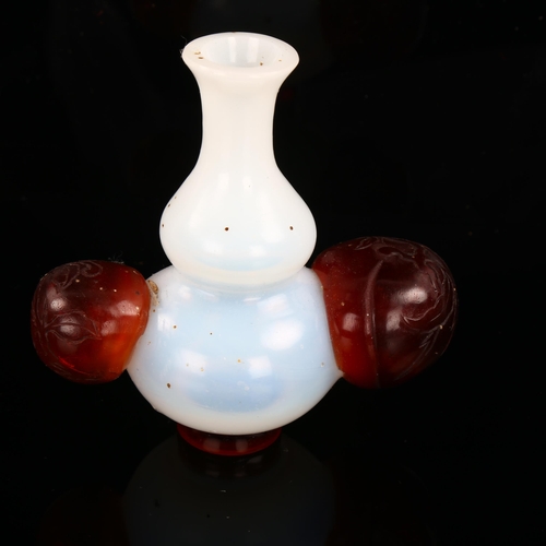 1146 - A Chinese two-colour Peking glass vase with fruit design handles, height 9.5cm