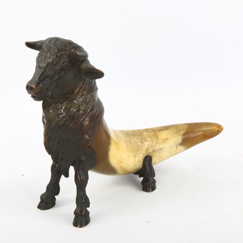 1148 - A Victorian bronze bull design desk ornament, Victorian diamond registration mark, height 15cm