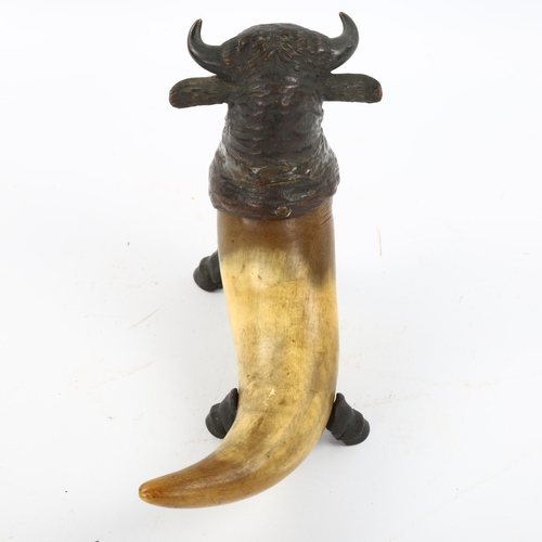 1148 - A Victorian bronze bull design desk ornament, Victorian diamond registration mark, height 15cm