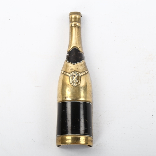 1152 - A French Art Deco champagne bottle design corkscrew, with impressed maker's marks, length 14cm