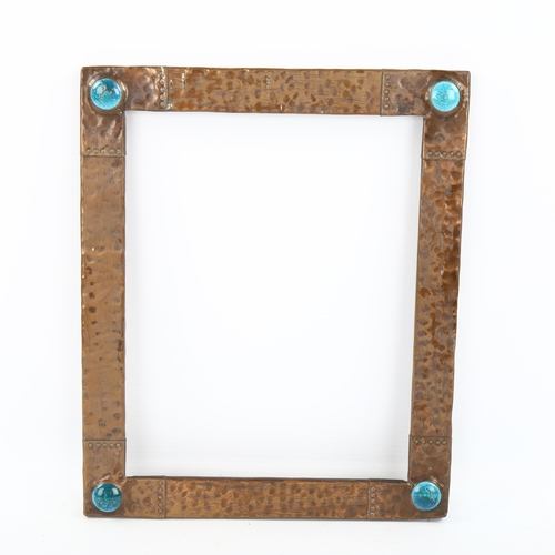 1167 - Arts and Crafts hammered copper photo frame, with inset Ruskin panels, overall dimensions 26.5cm x 2... 