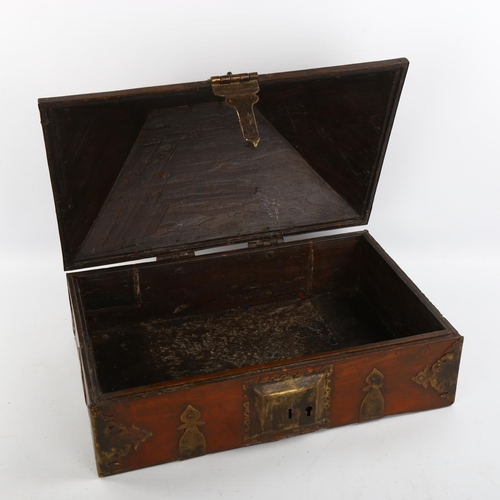 1173 - An Antique North African iron-bound wood casket, length 39cm