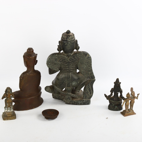 1182 - A group of Indian and Chinese bronze deities, a carved soapstone figure, height 24cm, and a small br... 