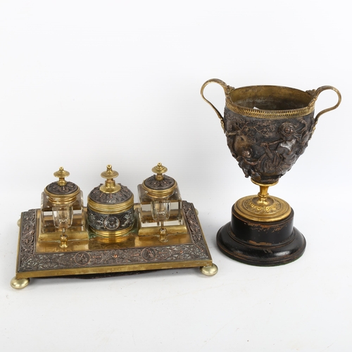 1186 - A Victorian brass and electroplate 2-handled goblet, on wood base, height to rim 19cm, and a Victori... 