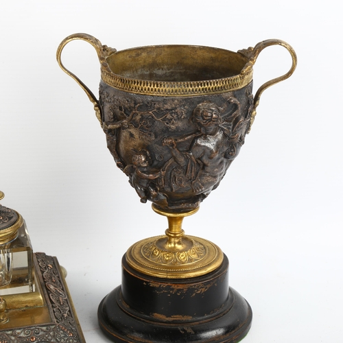 1186 - A Victorian brass and electroplate 2-handled goblet, on wood base, height to rim 19cm, and a Victori... 