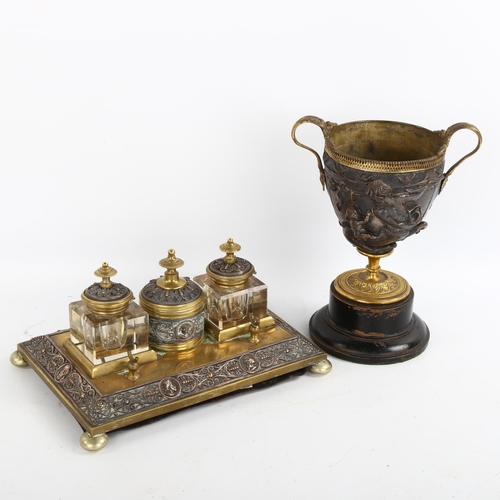 1186 - A Victorian brass and electroplate 2-handled goblet, on wood base, height to rim 19cm, and a Victori... 