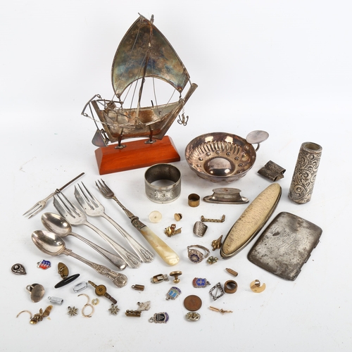 1200 - A Continental silver model boat, stamped 925, length 13cm, a plated wine tasting bowl, and a group o... 