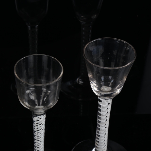 1201 - 2 similar 18th century cordial glasses with milk twist stems, largest height 15.5cm