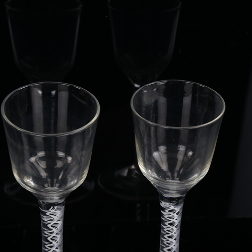 1202 - 2 similar 18th century cordial glasses with milk twist stems, height 15cm