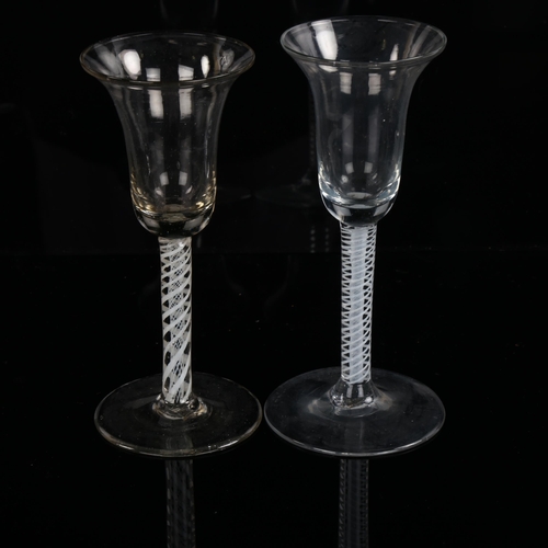 1203 - 2 similar 18th century cordial glasses with milk twist stems and bell-shaped bowls, height 16cm