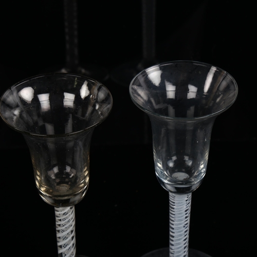 1203 - 2 similar 18th century cordial glasses with milk twist stems and bell-shaped bowls, height 16cm