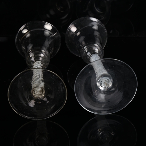 1203 - 2 similar 18th century cordial glasses with milk twist stems and bell-shaped bowls, height 16cm