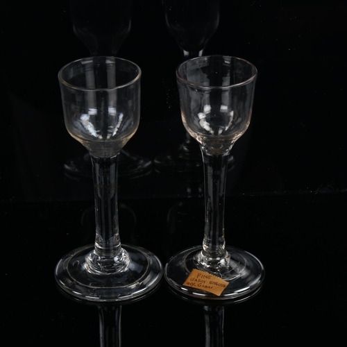 1205 - 2 similar 18th century cordial glasses with folded feet, height 14cm