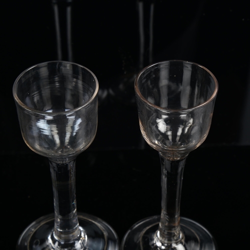 1205 - 2 similar 18th century cordial glasses with folded feet, height 14cm