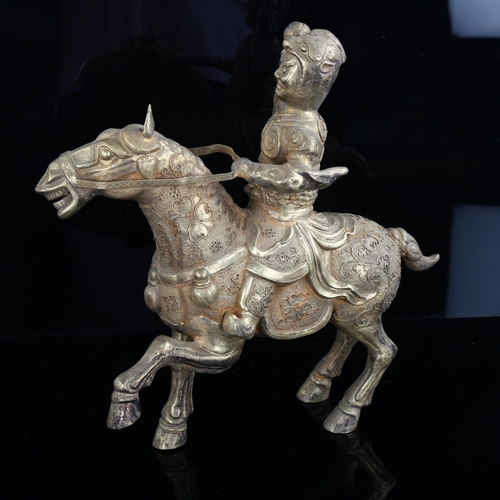 1208 - A Chinese gilt-metal horse and rider, with highly detailed applied wirework decoration, height 28cm,... 