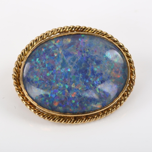 351 - A late 20th century 9ct gold opal doublet brooch, with rope twist surround, hallmarks London 1978, b... 