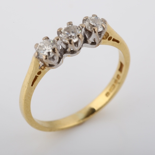 352 - An 18ct gold three stone diamond ring, set with modern round brilliant-cut diamonds, total diamond c... 