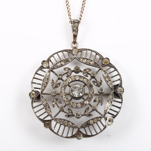 356 - A Belle Epoque paste openwork pendant/brooch necklace, unmarked silver settings with sterling fine c... 