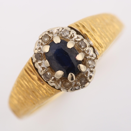 360 - A late 20th century 18ct gold sapphire and diamond cluster ring, set with oval mixed-cut sapphire an... 