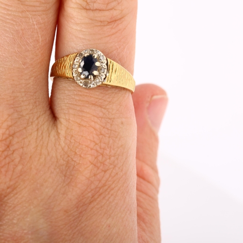 360 - A late 20th century 18ct gold sapphire and diamond cluster ring, set with oval mixed-cut sapphire an... 