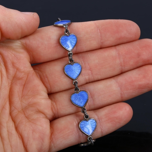 365 - VOLMER BAHNER - a Danish stylised sterling silver and blue enamel heart matching necklace and bracel... 