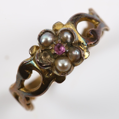 366 - A Victorian garnet and pearl flowerhead cluster ring, unmarked gold closed-back settings, setting he... 