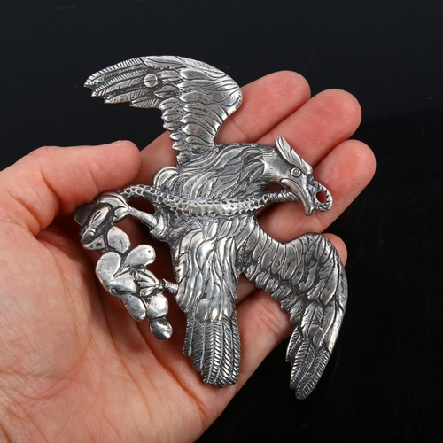 376 - A large and heavy eagle and snake pendant/belt buckle?, unmarked silver settings, wingspan 106.8mm, ... 