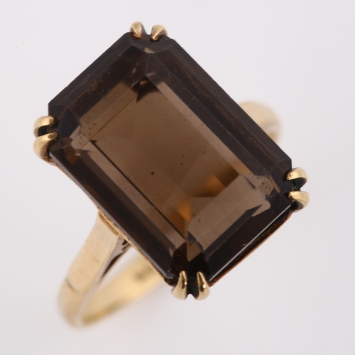 379 - A mid-20th century 9ct gold smoky quartz dress ring, set with rectangular step-cut quartz, hallmarks... 