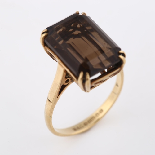 379 - A mid-20th century 9ct gold smoky quartz dress ring, set with rectangular step-cut quartz, hallmarks... 